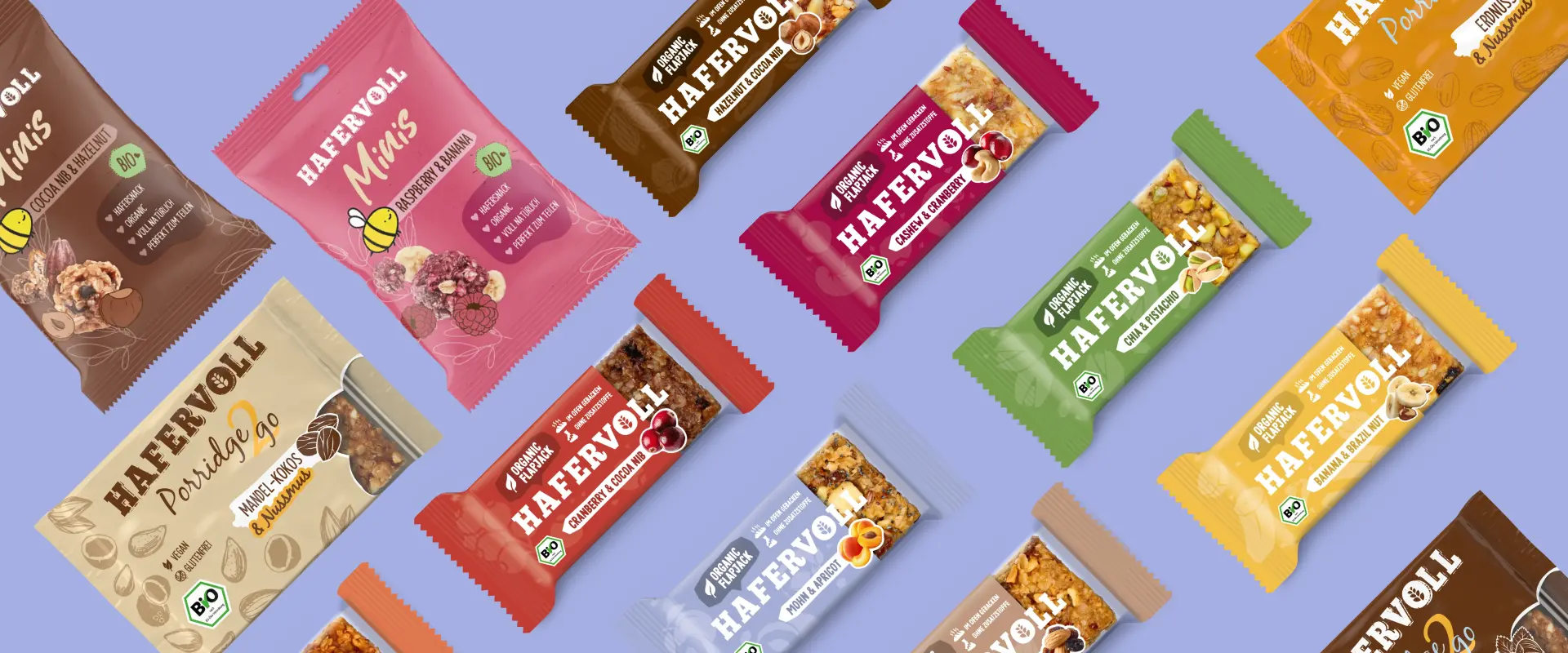 Alle HAFERVOLL Produkte nebeneinander: Flapjack-Riegel, Minis und Porridge2Go in verschiedenen Sorten